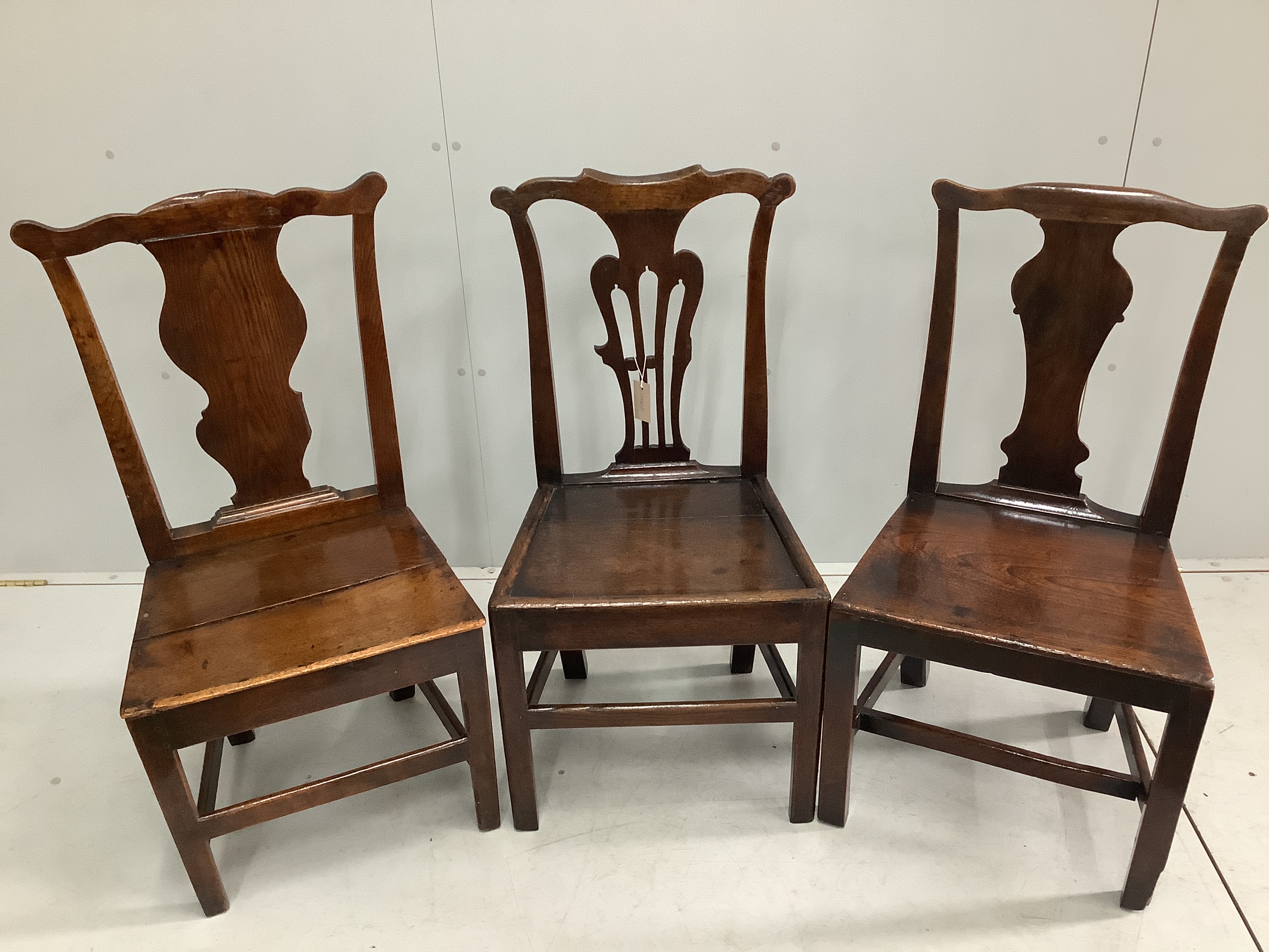 Three 18th century provincial oak and fruitwood dining chairs
